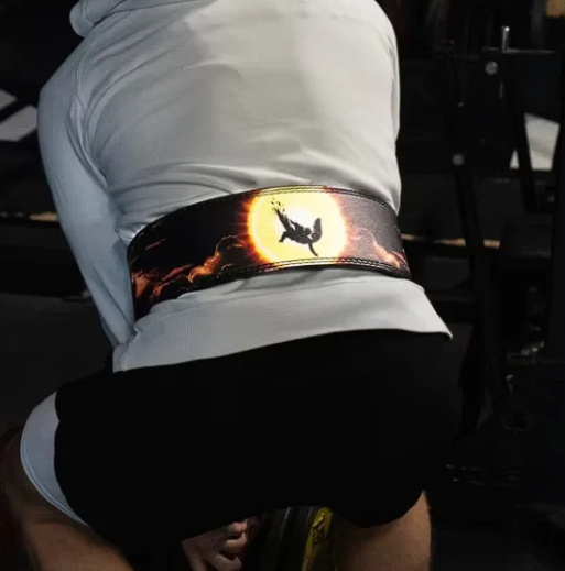 Powerlifter wearing Icarus Falling powerlifting belt with unique design.