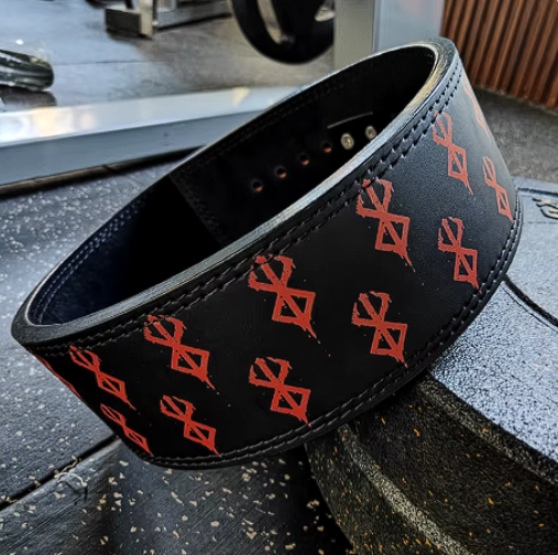 Berserk powerlifting belt made from durable cowhide leather with bold red design, featuring a robust steel buckle for maximum support.