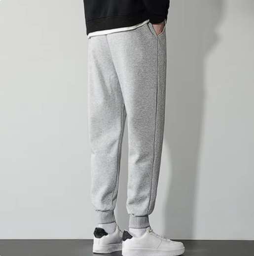 Gray Berserk sweatpants featuring a sleek design, adjustable waistband, and deep pockets, ideal for gym and casual wear.