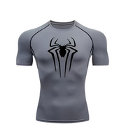 Spiderman compression shirt with black spider logo, short sleeves, moisture-wicking fabric.