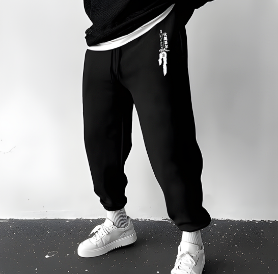 Jujutsu Kaisen sweatpants with anime-inspired graphics, adjustable waistband, and deep pockets for gym workouts.